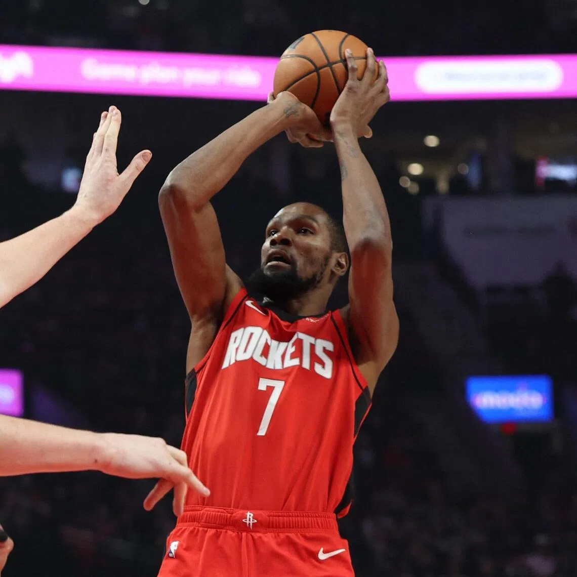 Houston Rockets' Kevin Durant (right) shooting the ball over Portland's Donovan Clingan in the Trail Blazers' 103-102 win on Jan 7.