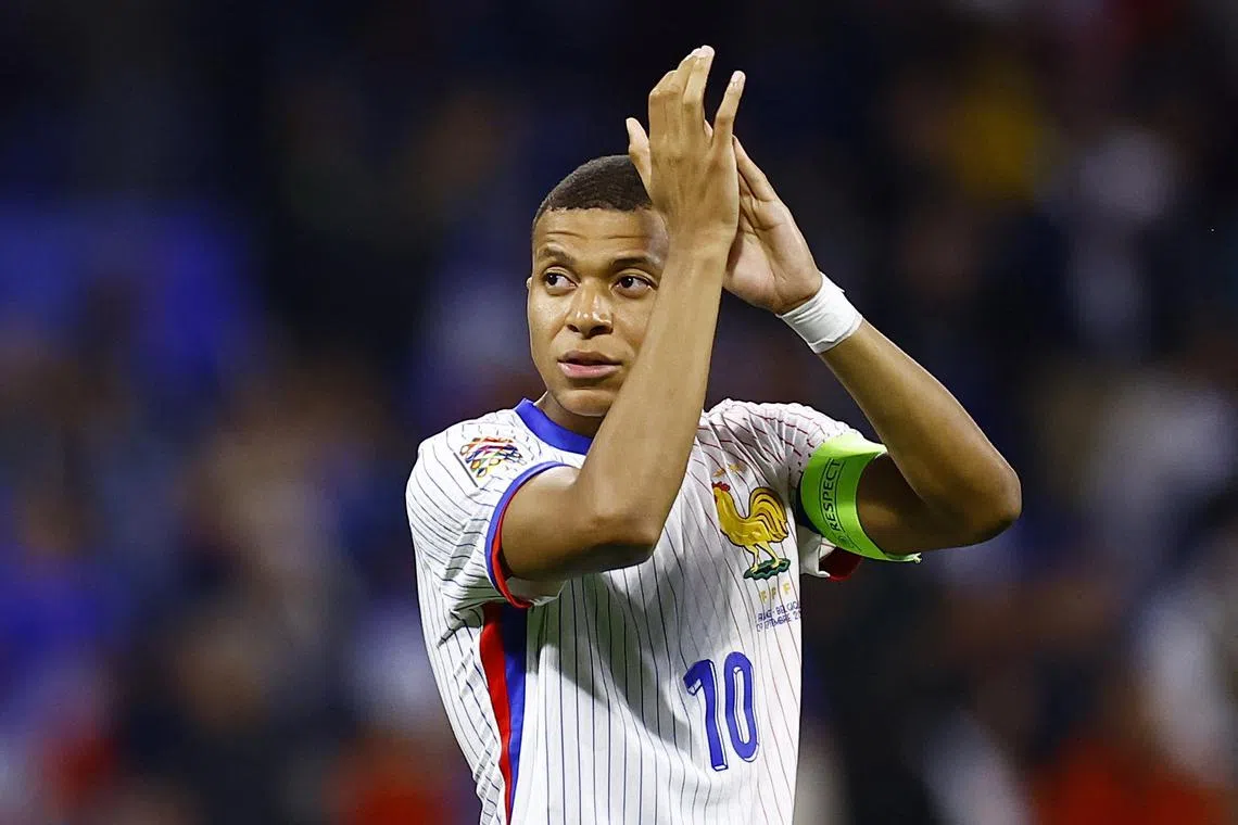 FILE PHOTO: Soccer Football - Nations League - League A - Group 2 - France v Belgium - Groupama Stadium, Lyon, France - September 9, 2024 France's Kylian Mbappe applauds fans after the match REUTERS/Sarah Meyssonnier/File Photo