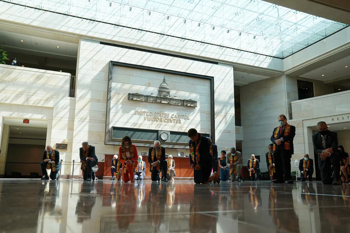 US senators and Congress members observing a moment of silence at the US Capitol in Washington on June 8, 2020, to honour Mr George Floyd and other victims of police brutality.