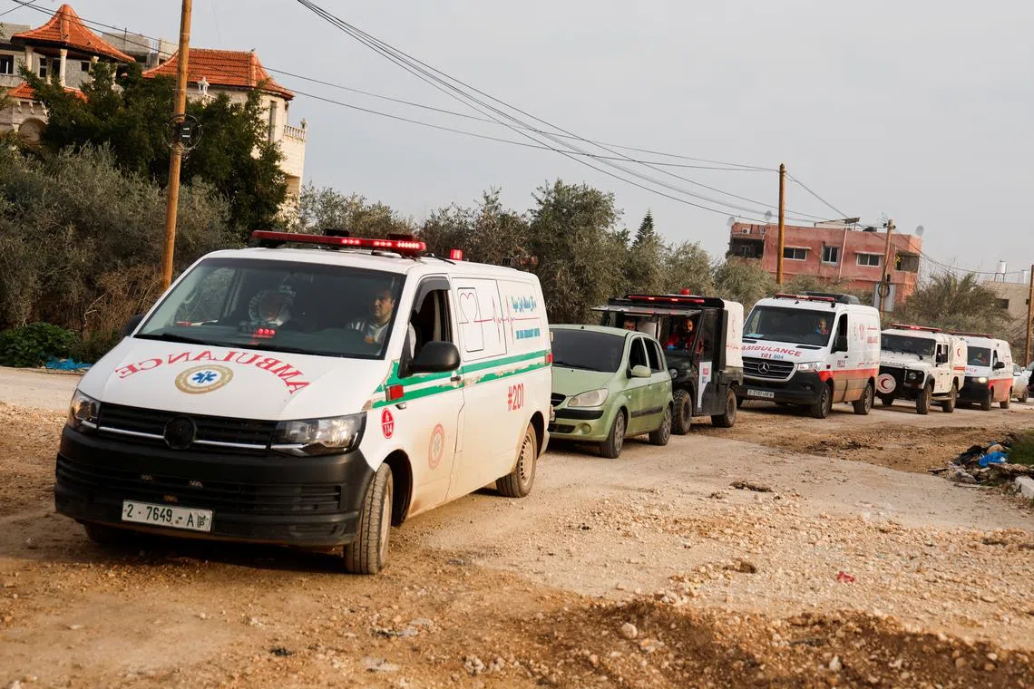FILE PHOTO: Ambulances carrying the bodies of Palestinians killed during an Israeli raid, arrive for the funeral, in Jenin, in the Israeli-occupied West Bank, February 3, 2025. REUTERS/Raneen Sawafta/File Photo