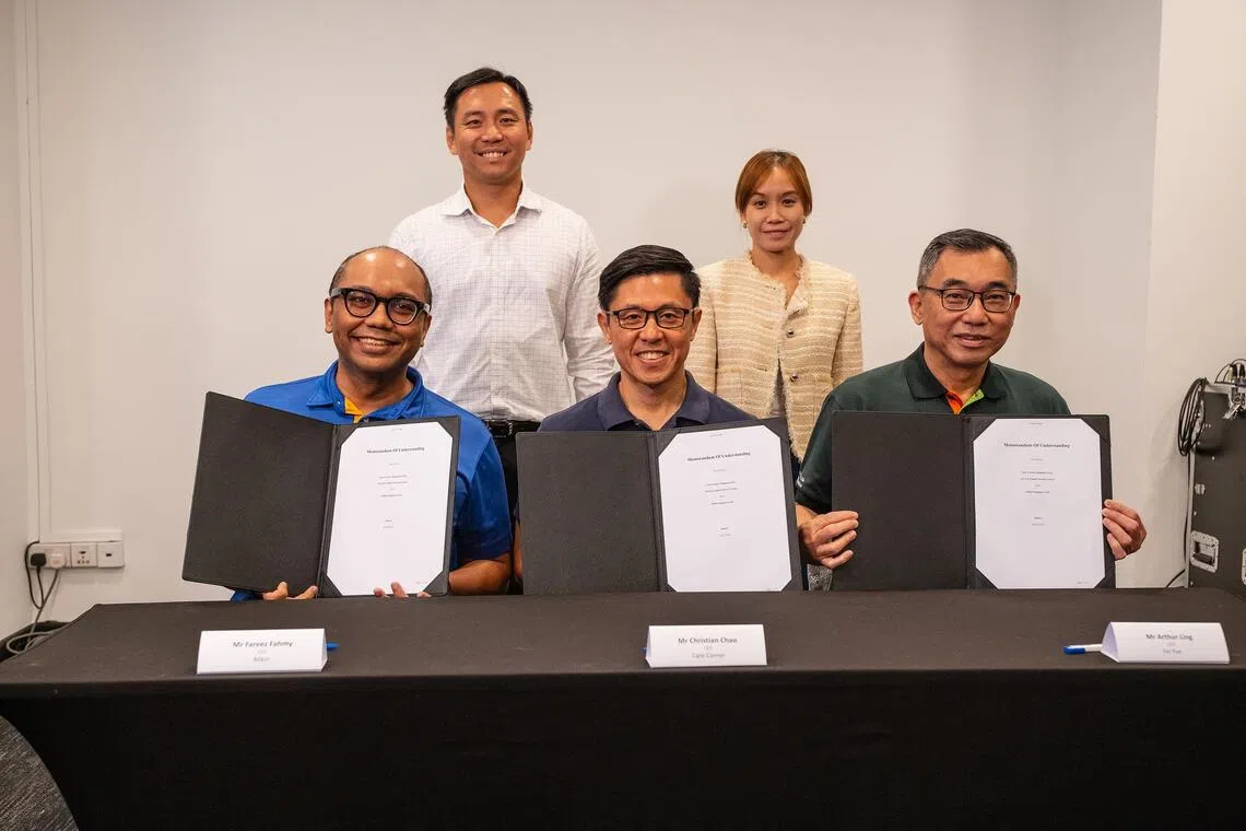 (First row, from left to right) Mr Fareez Fahmy, Chief Executive Officer of Allkin Singapore, Mr Christian Chao, Chief Executive Officer of Care Corner Singapore and Mr Arthur Ling, Chief Executive of Fei Yue Community Service.
