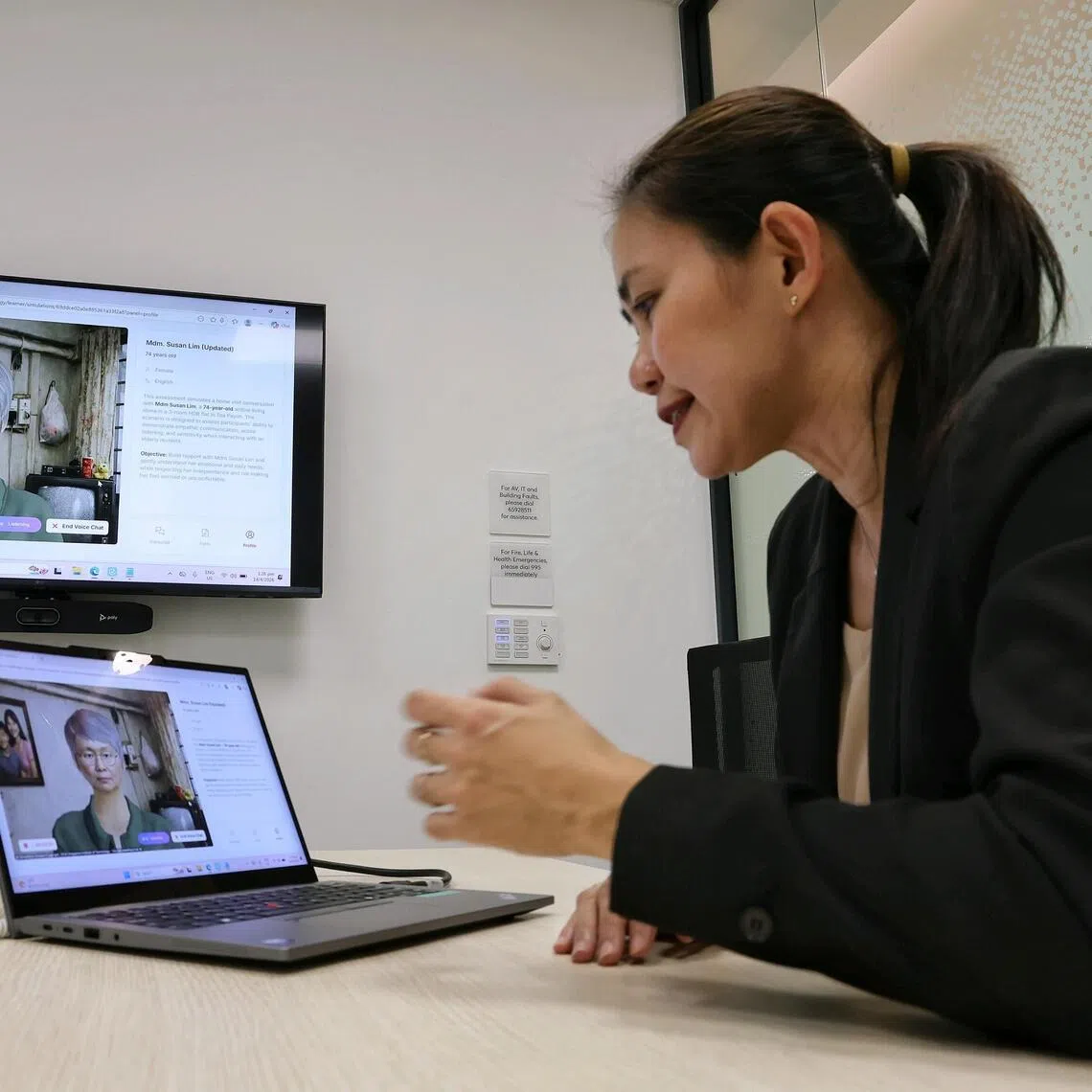 SIT associate professor May Lim interacting with an AI avatar. Part of SIT’s Centralised Skills Assessment and Validation Initiative involves interacting with an AI avatar designed to portray a disengaged and challenging elderly individual.