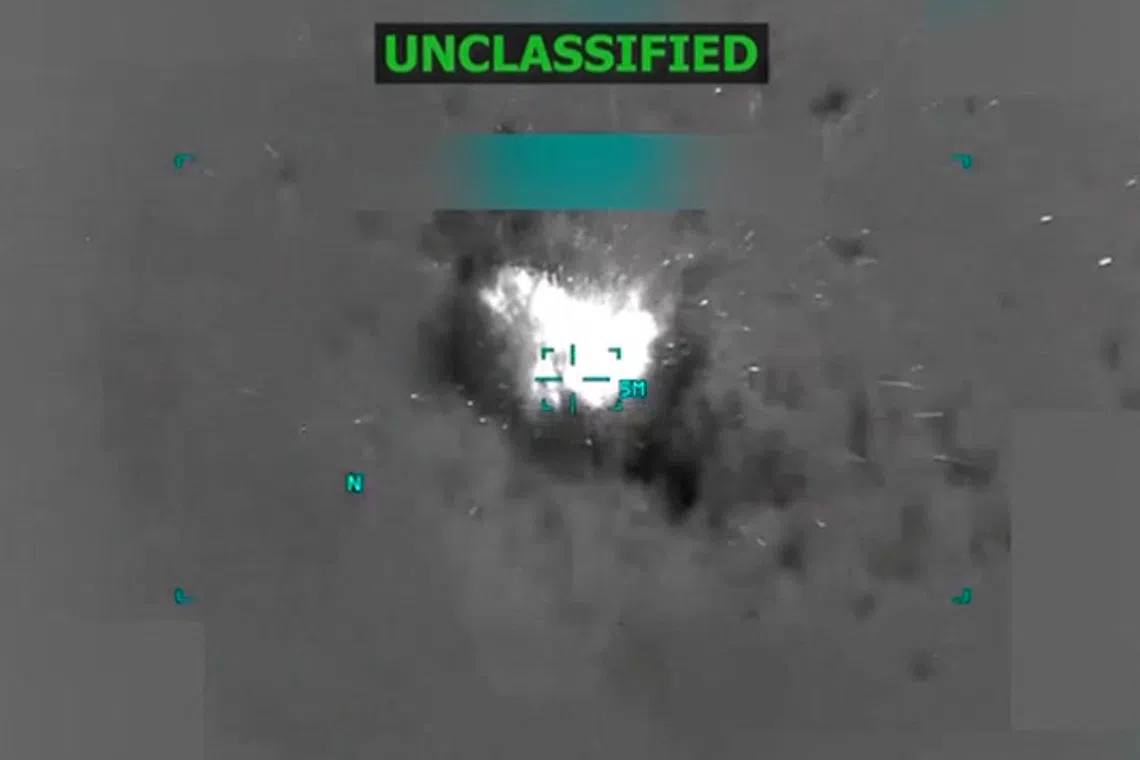A boat burns off the coast of Venezuela in this screen grab taken from a video released October 14, 2025, depicting what U.S. President Donald Trump said on a post on Truth Social was a U.S. strike on a suspected drug-trafficking boat. Donald Trump via Truth Social/via REUTERS