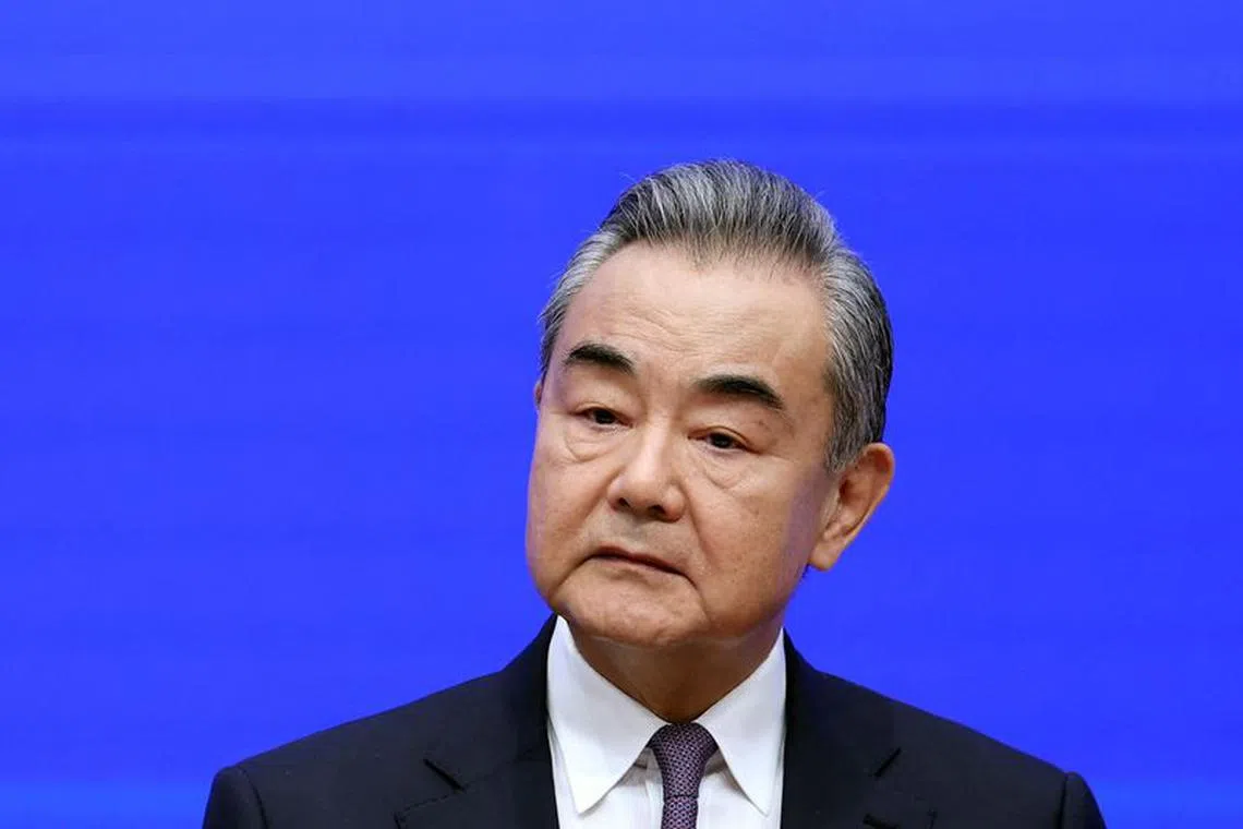 FILE PHOTO: Chinese Foreign Minister Wang Yi attends a press conference on the white paper on &quot;A Global Community of Shared Future: China&#039;s Proposals and Actions&quot;, in Beijing, China September 26, 2023. REUTERS/Shubing Wang/File Photo