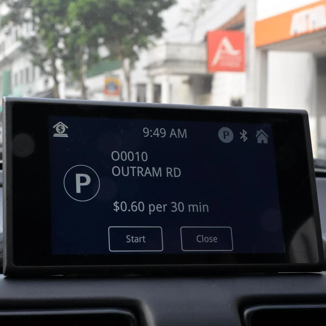 Tapping the touchscreen display of the vehicle on-board unit will start the parking session.