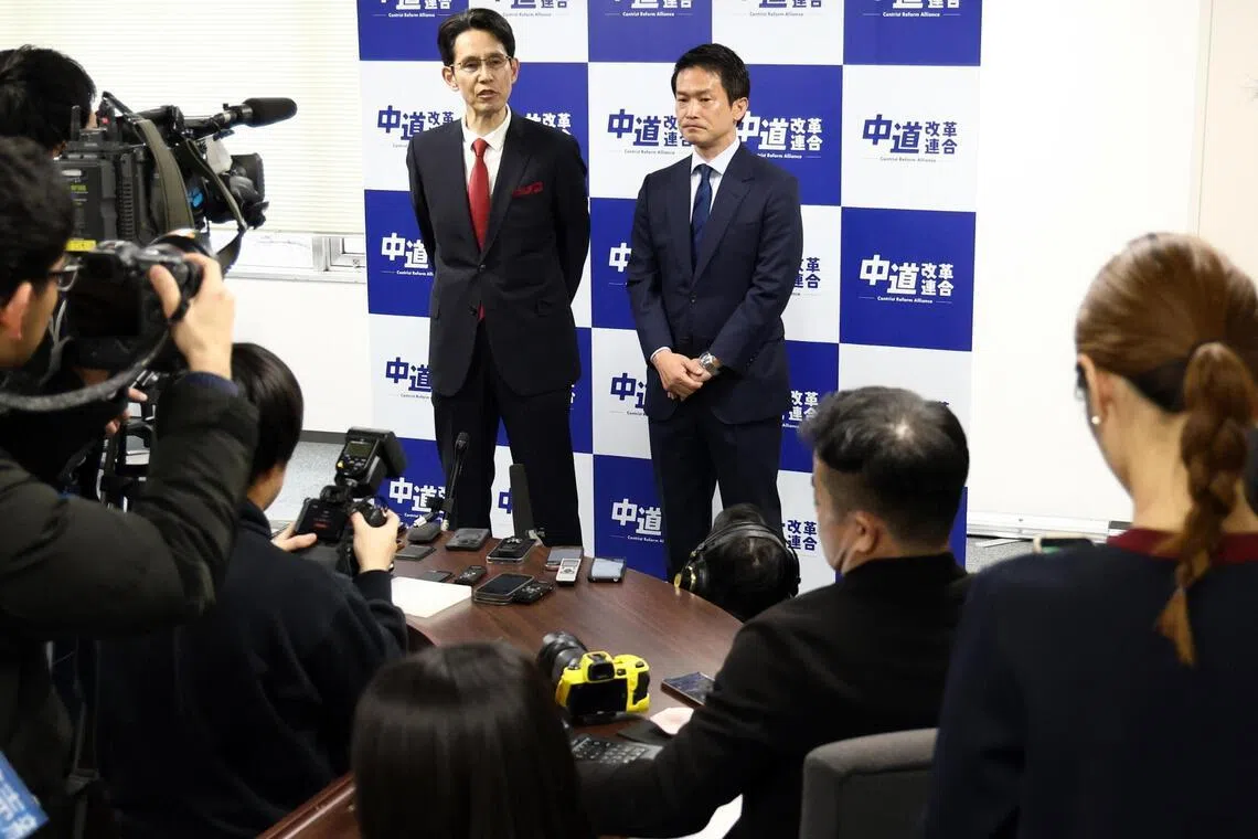 Centrist Reform Alliance party's Junya Ogawa (R) speaks to reporters before the party elections on Feb 13.
