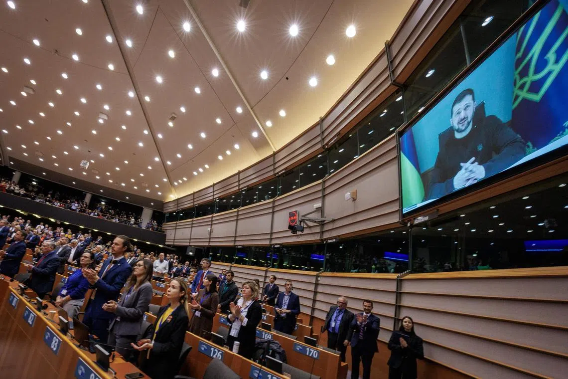 Ukrainian President Volodymyr Zelensky speaking to the European Parliament via live video link from Ukraine, on Nov 19.