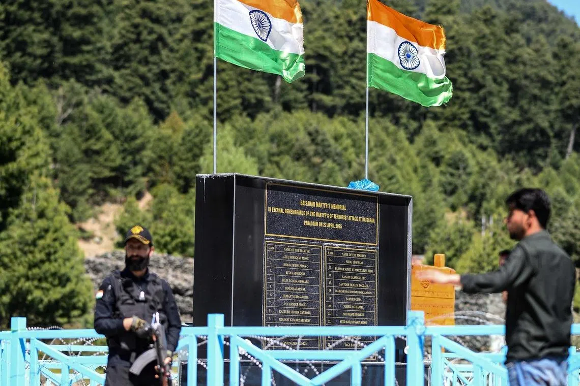 Indian national flags at the memorial site for the victims of the 2025 terror attack in Pahalgam in south Kashmir's Anantnag district on April 22. India blamed Pakistan for backing the attack.