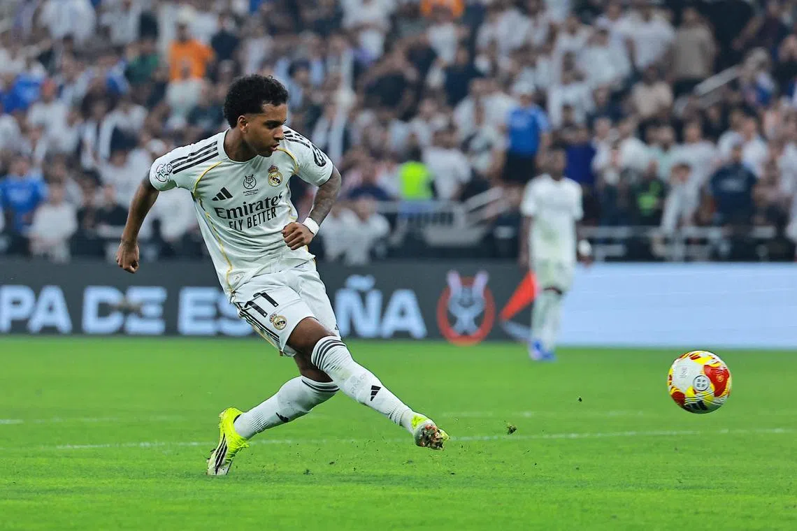 Soccer - Spanish Super Cup - Semi Final - Atletico Madrid v Real Madrid - King Abdullah Sports City, Jeddah, Saudi Arabia - January 8, 2026 Real Madrid's Rodrygo scores their second goal REUTERS/Stringer