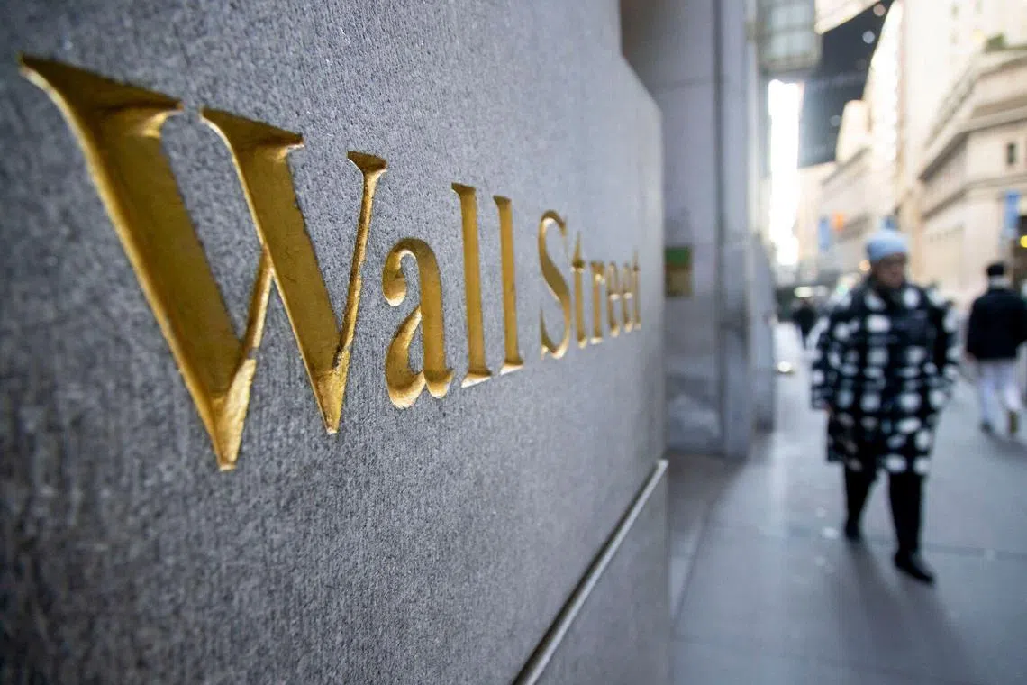 Wall Street signage across form the New York Stock Exchange (NYSE) in New York, US, on Thursday, Jan. 2, 2025. US stocks powered higher on the back of optimism over the technology giants, signaling that Wall Street is set to rebound from the four-day slump that marked the end of 2024. Photographer: Michael Nagle/Bloomberg