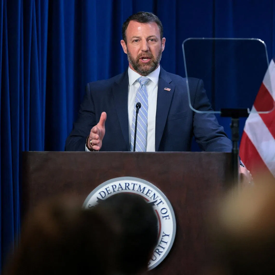 U.S. Secretary of Homeland Security Markwayne Mullin delivers remarks at an event honoring fallen police officers and federal agents at ICE Headquarters in Washington, D.C., U.S., May 13, 2026. REUTERS/Jonathan Ernst