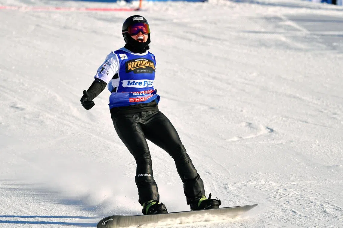 FIS Freestyle Ski Cross and Snowboard Cross World Championships - Idre Fjall, Sweden - February 12, 2021  Australia's Belle Brockhoff celebrates after winning the FIS Mixed Snowboardcross Team World Championships event  Anders Wiklund/TT News Agency via REUTERS