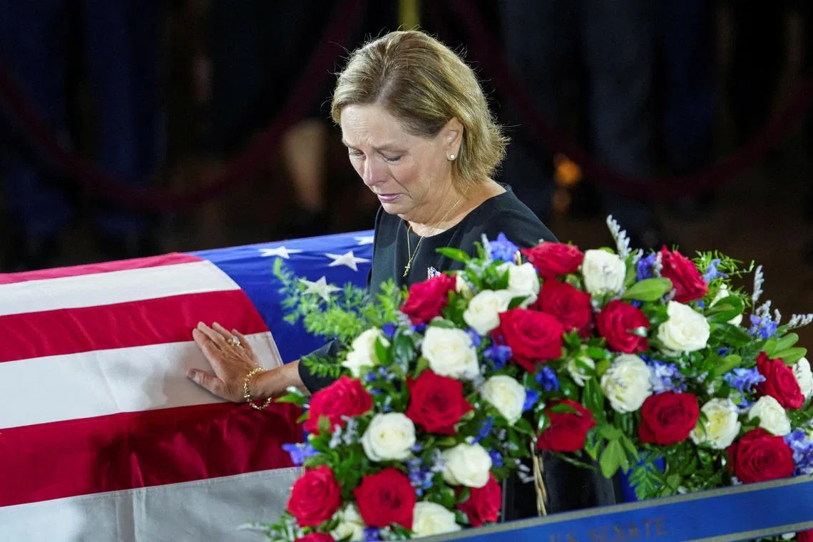 U.S. Senator Darline Graham (R-SC), sister of late U.S. Senator Lindsey Graham (R-SC), mourns by his casket, during a Congressional Tribute to late U.S. Senator Lindsey Graham (R-SC) at the Rotunda of the U.S. Capitol in Washington, D.C., U.S., July 28, 2026. REUTERS/Nathan Howard/Pool