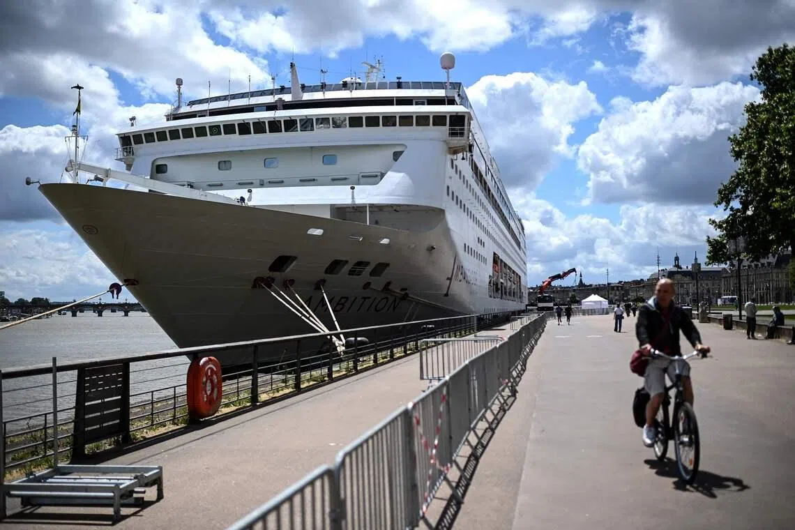 The Bahamas-registered cruise ship Ambition docks at the Bordeaux port on May 13.