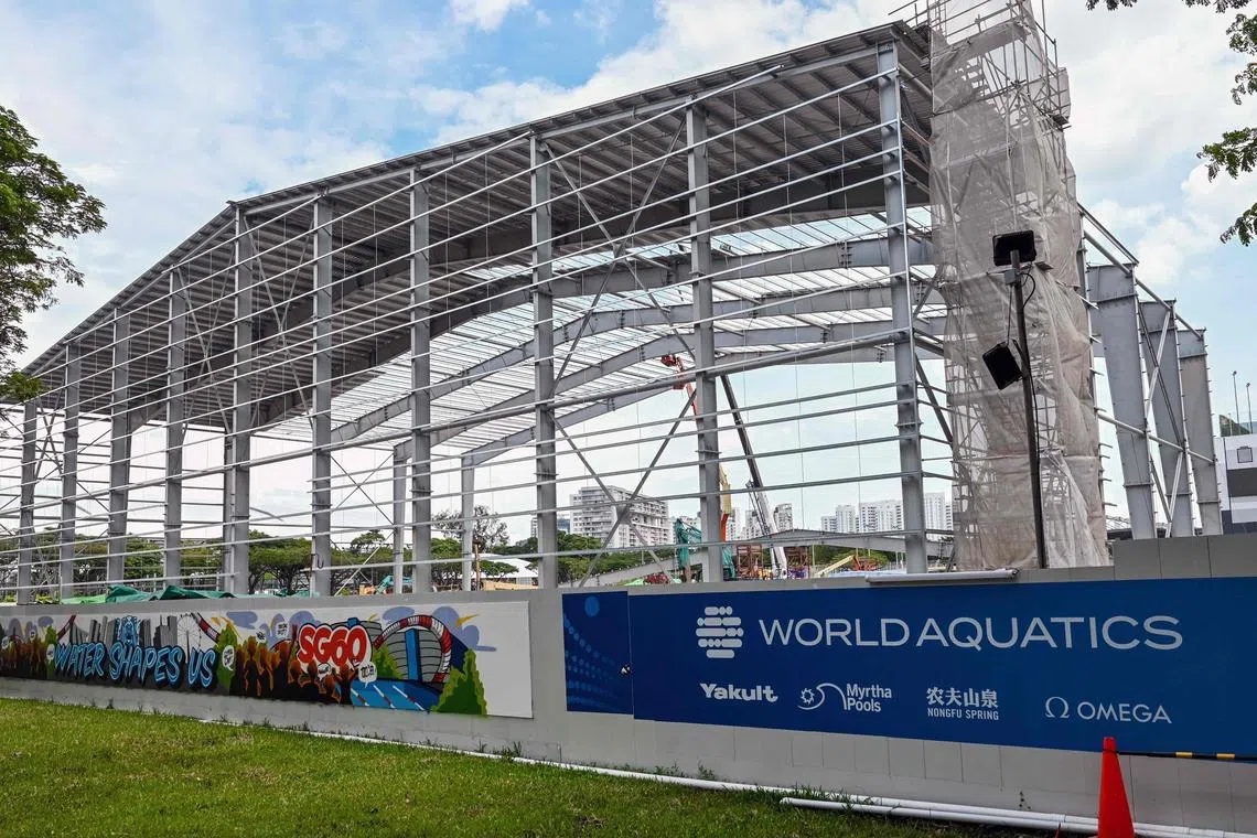 The aquatics arena is pictured during its construction for the upcoming World Aquatics Championships 2025 in Singapore on February 4, 2025. (Photo by Roslan RAHMAN / AFP)