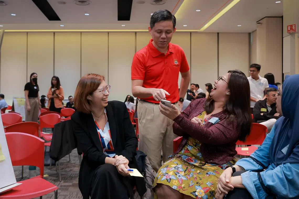 Mr Chan Chun Sing speaking with attendees at a Forward Singapore group discussion session, on Nov 19, 2022.