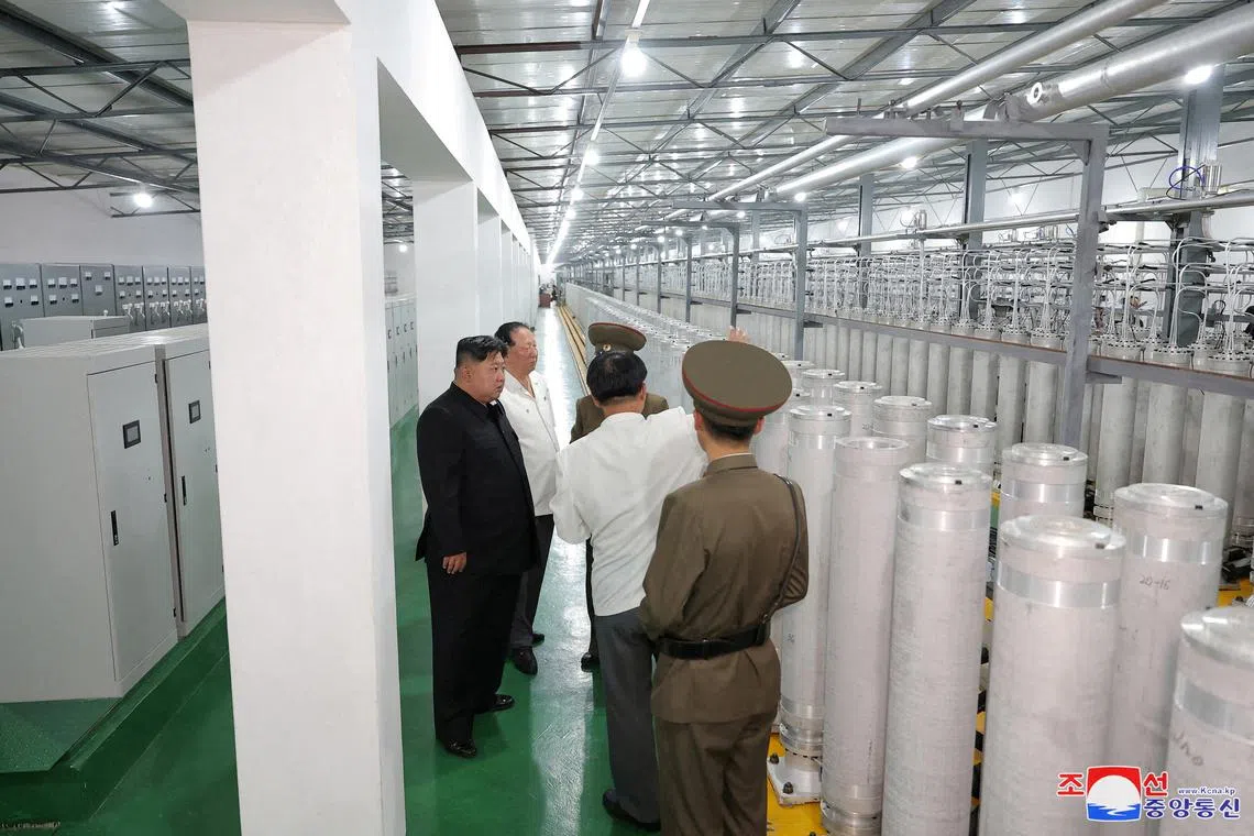 FILE PHOTO: North Korean leader Kim Jong Un tours facilities during a visit to the Nuclear Weapons Institute and the production base of weapon-grade nuclear materials at an undisclosed location in North Korea, in this photo released by North Korea's official Korean Central News Agency September 13, 2024. KCNA via REUTERS/File Photo