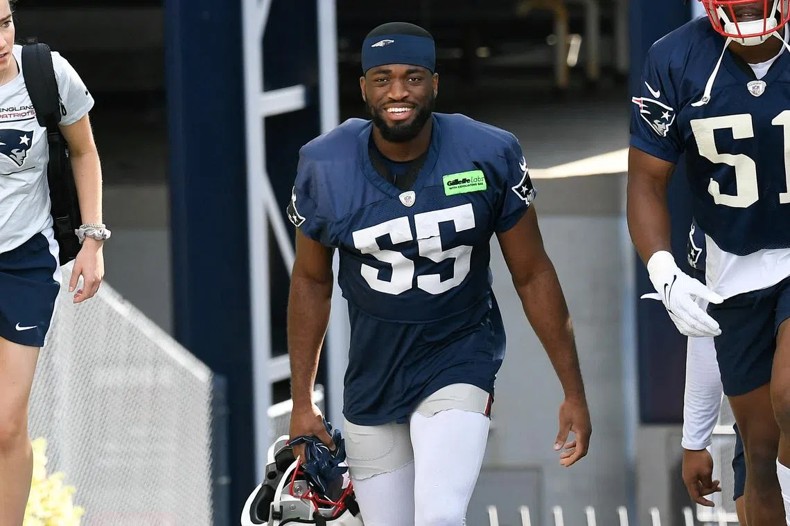 Jul 30, 2022; Foxborough, MA, USA; New England Patriots linebacker Josh Uche (55) walks to the practice field at the Patriots training camp at Gillette Stadium. Mandatory Credit: Eric Canha-USA TODAY Sports