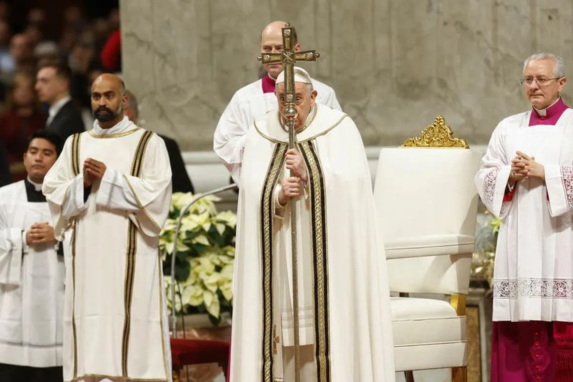 Pope Francis celebrates Christmas Eve mass in St. Peter's Basilica at the Vatican, December 24, 2023. REUTERS/Remo Casilli