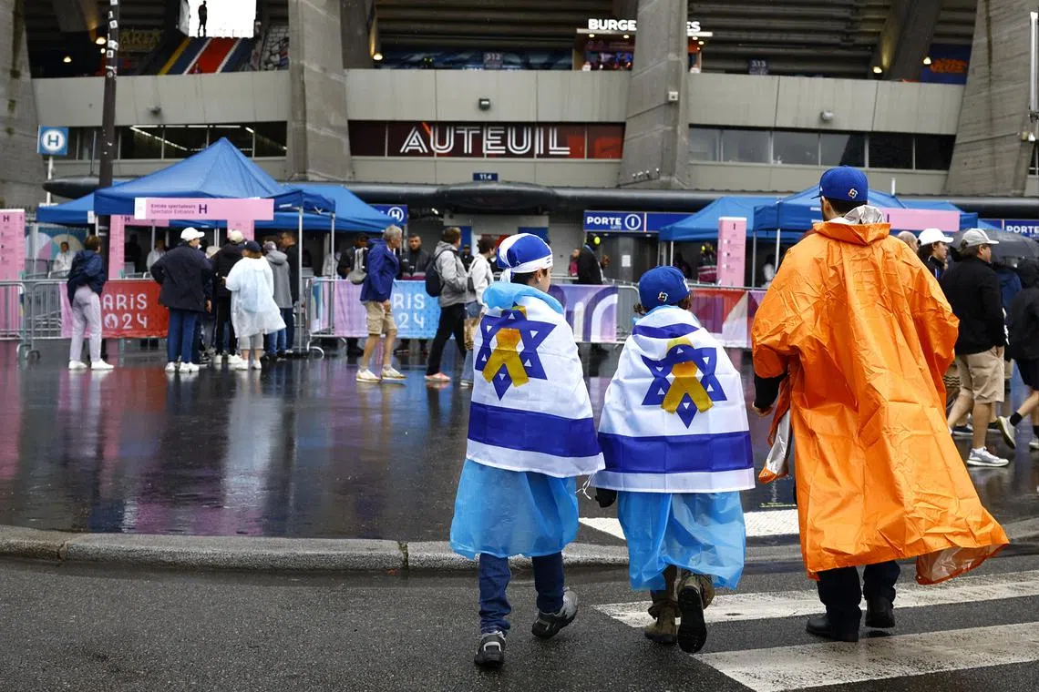 Paris 2024 Olympics - Football - Men's Group D - Israel vs Paraguay - Parc des Princes, Paris, France - July 27, 2024. Israel fans outside the stadium before the match. REUTERS/Sarah Meyssonnier