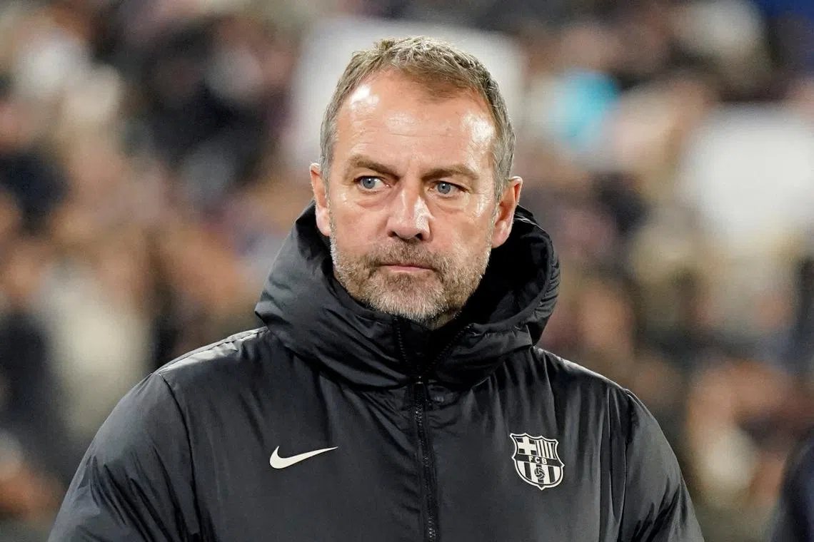 FILE PHOTO: Soccer Football - LaLiga - Getafe v FC Barcelona - Estadio Coliseum, Getafe, Spain - January 18, 2025 FC Barcelona coach Hansi Flick before the match REUTERS/Ana Beltran/File Photo