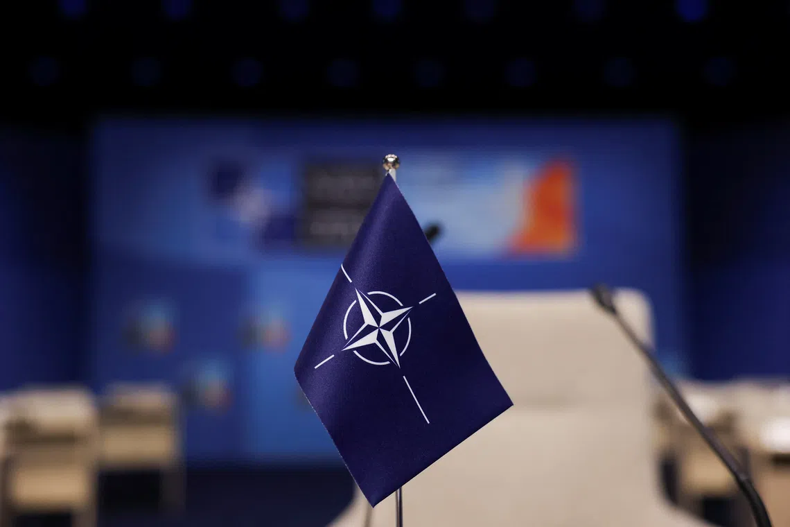 The NATO flag is pictured at the venue of the upcoming NATO summit, in The Hague, Netherlands June 23, 2025. REUTERS/Christian Hartmann
