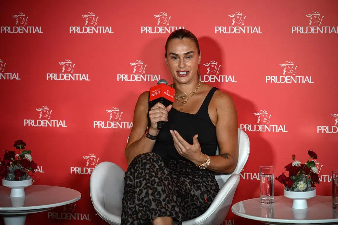 Aryna Sabalenka speaks as she attends a media event with US former tennis player Andre Agassi (not pictured) in Hong Kong on Oct 14, 2025. 