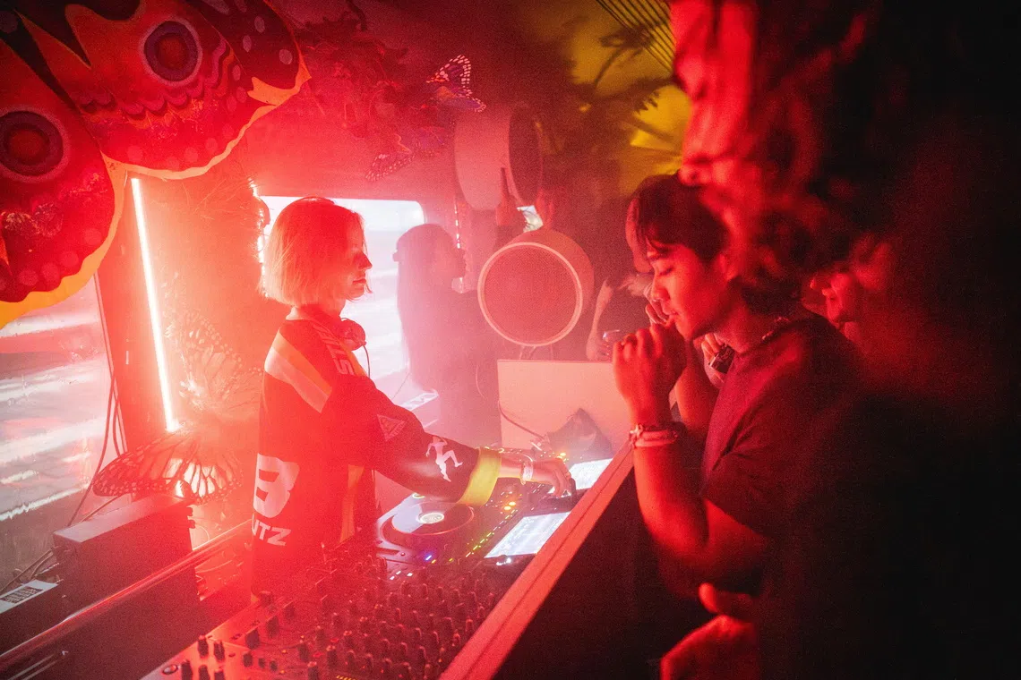 DJ Julia Linkogel preparing to perform on the 50:HERTZ CLUB TRAIN, which will travel through Amsterdam during the Amsterdam Dance Event (ADE), in Amsterdam, Netherlands on Oct 23, 2025. The dance festival features five days of performances, parties, panels, and workshops throughout the capital.  