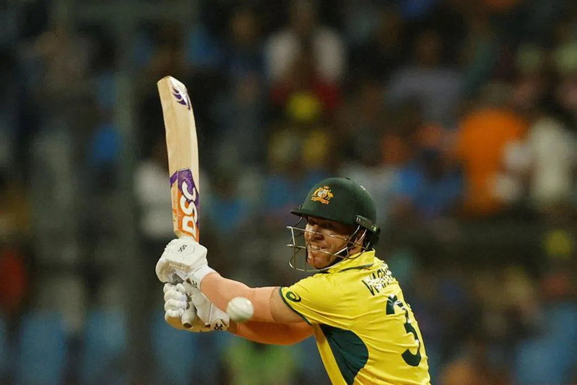 FILE PHOTO: Cricket - ICC Cricket World Cup 2023 - Australia v Afghanistan - Wankhede Stadium, Mumbai, India - November 7, 2023 Australia's David Warner in action REUTERS/Francis Mascarenhas/File Photo