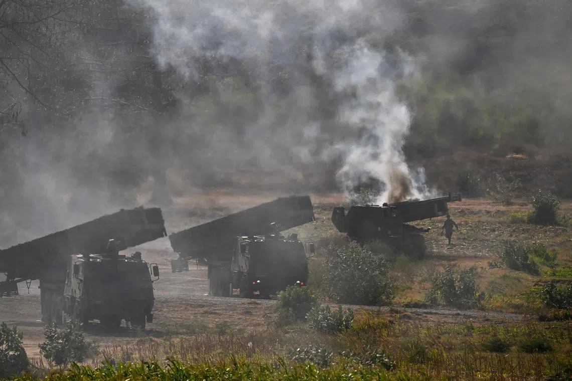 Original caption: Members of the US military (right) prepare the M142 High Mobility Artillery Rocket System (HIMARS) during the Super Garuda Shield 2024 joint military exercise including Indonesia, Japan, Singapore, Australia, Britain and the US in Situbondo, East Java on September 6, 2024. (Photo by JUNI KRISWANTO / AFP)