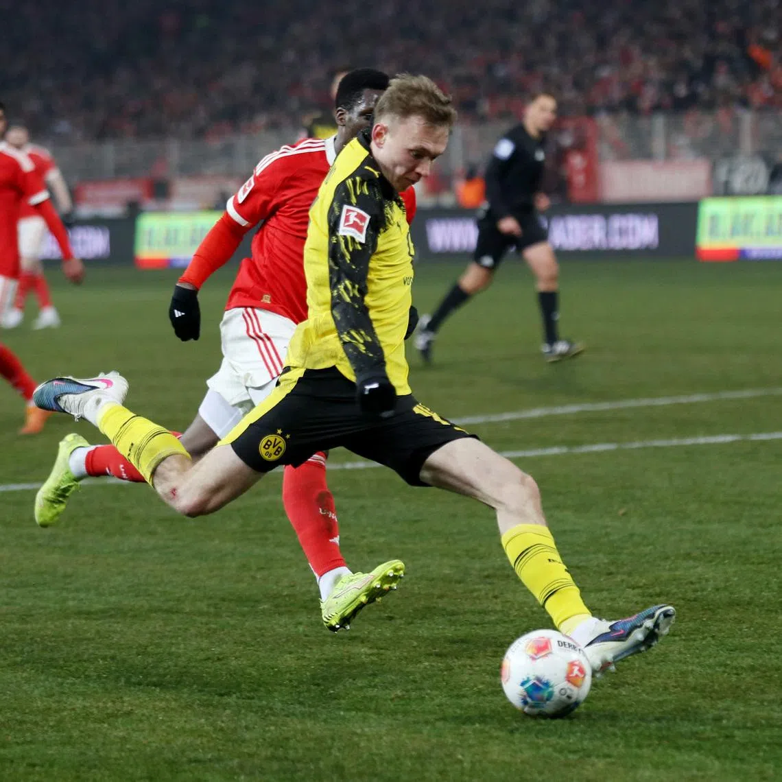 Soccer Football - Bundesliga - 1. FC Union Berlin v Borussia Dortmund - Stadion An der Alten Forsterei, Berlin, Germany - January 24, 2026 Borussia Dortmund's Maximilian Beier scores their third goal REUTERS/Maryam Majd