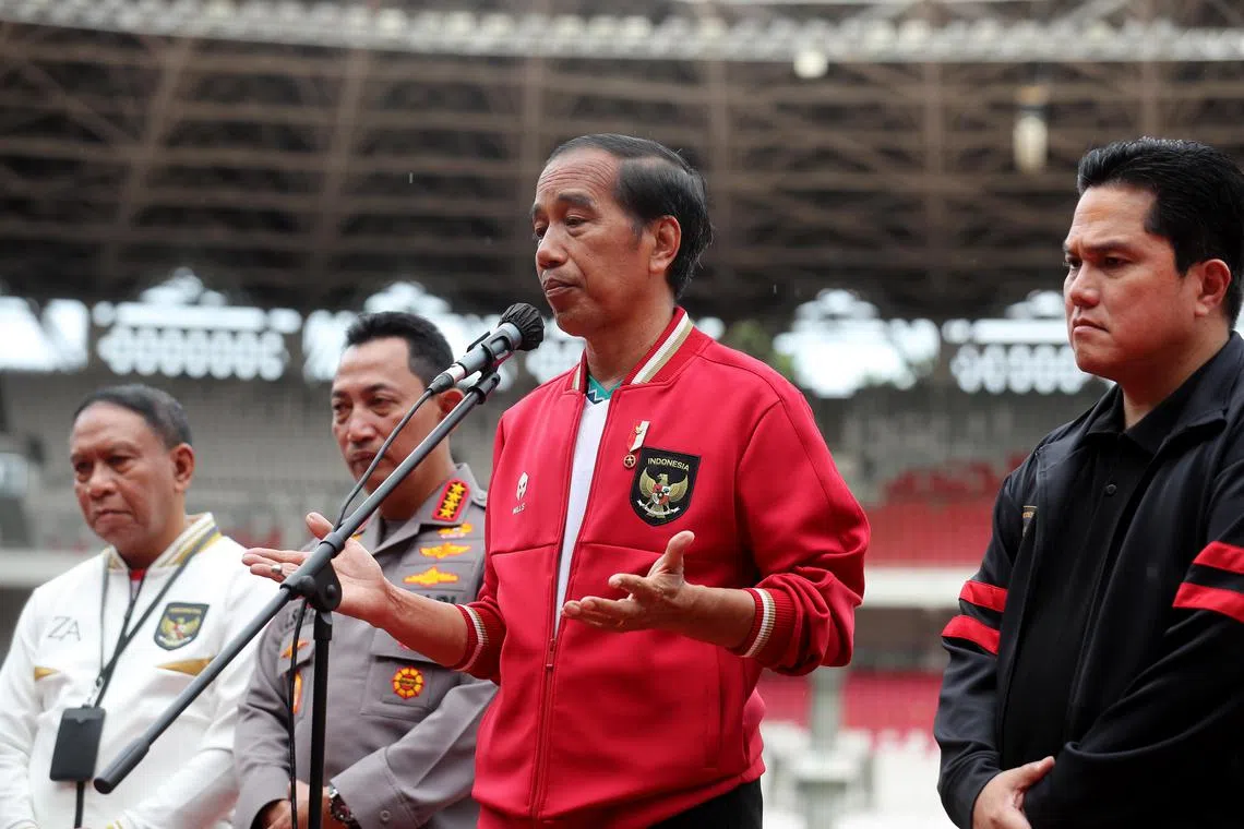 (From left) PSSI deputy chairman Zainudin Amali, national police chief Listyo Sigit Prabowo, Indonesian President Joko Widodo and PSSI chairman Erick Thohir speak to the press, during a meeting with Indonesia's U-20 national soccer team following Fifa's hosting decision.