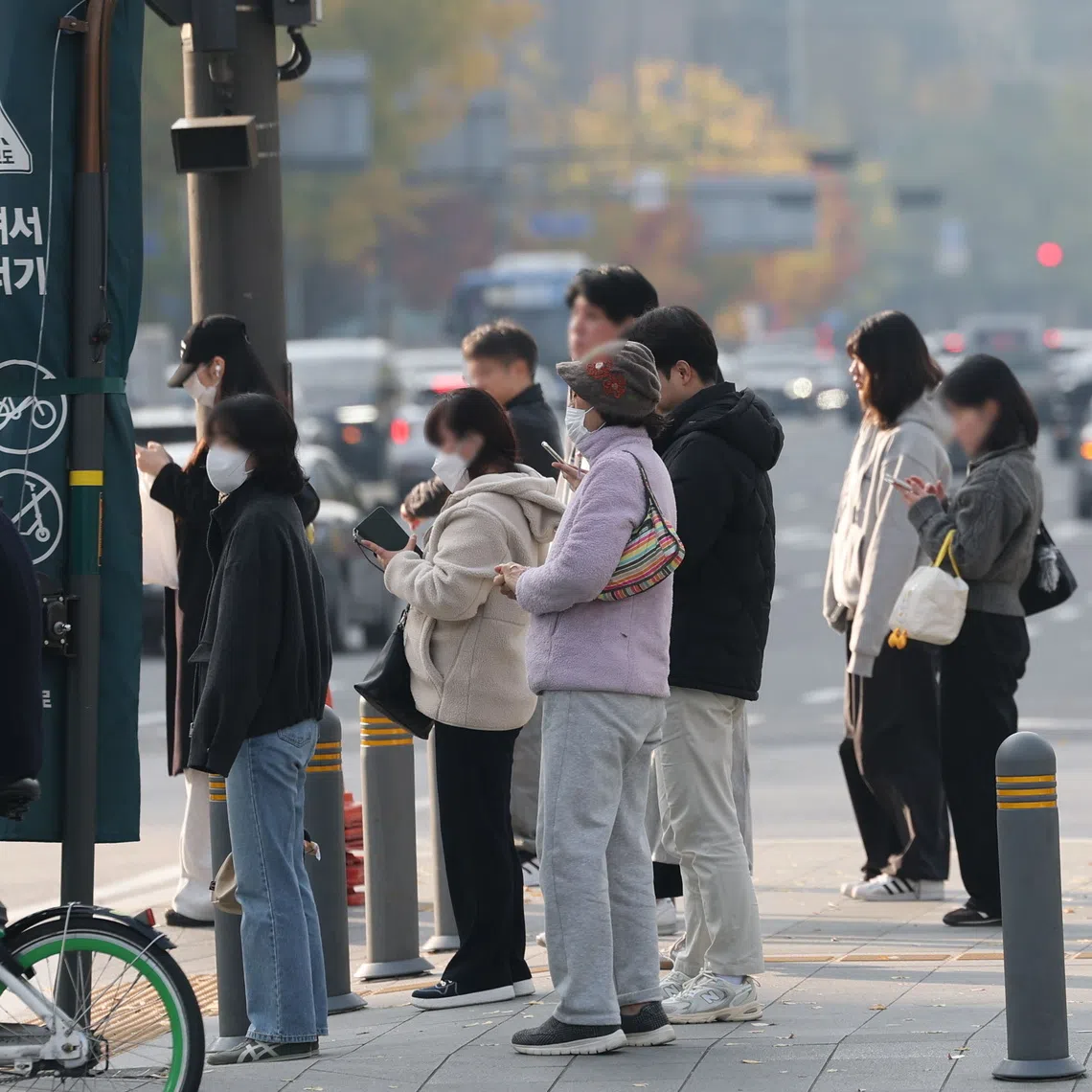 Experts say South Koreans’ love of neutral fashion reflects both cultural psychology and practicality.