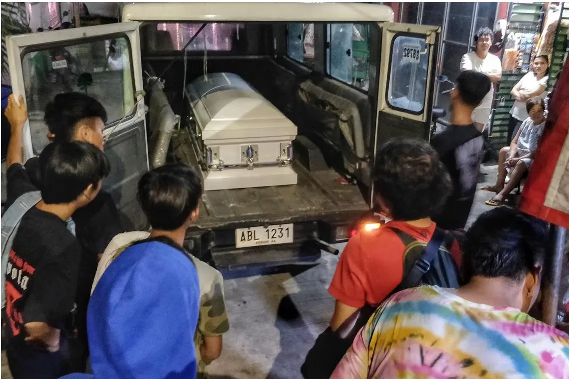 Jerhode Baltazar arrives home in a casket. He was shot by police in a case of mistaken identity.