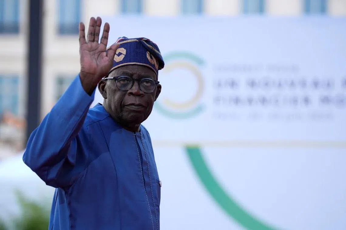 FILE PHOTO: Bola Tinubu, President of Nigeria, arrives for the closing session of the New Global Financial Pact Summit, Friday, June 23, 2023 in Paris, France. Lewis Joly/Pool via REUTERS