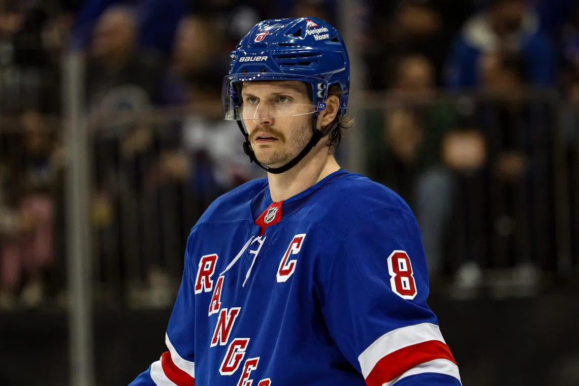 Nov 25, 2024; New York, New York, USA; New York Rangers defenseman Jacob Trouba (8) skates against the St. Louis Blues during the first period at Madison Square Garden. Mandatory Credit: Danny Wild-Imagn Images/ File Photo