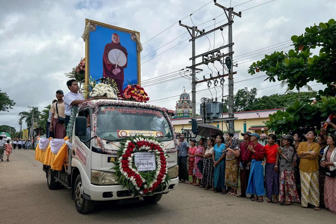Mourners attend the funeral of popular Buddhist abbot Sayadaw Bhaddanta Munindabhivamsa in Myanmar's south central Bago region on June 27.
