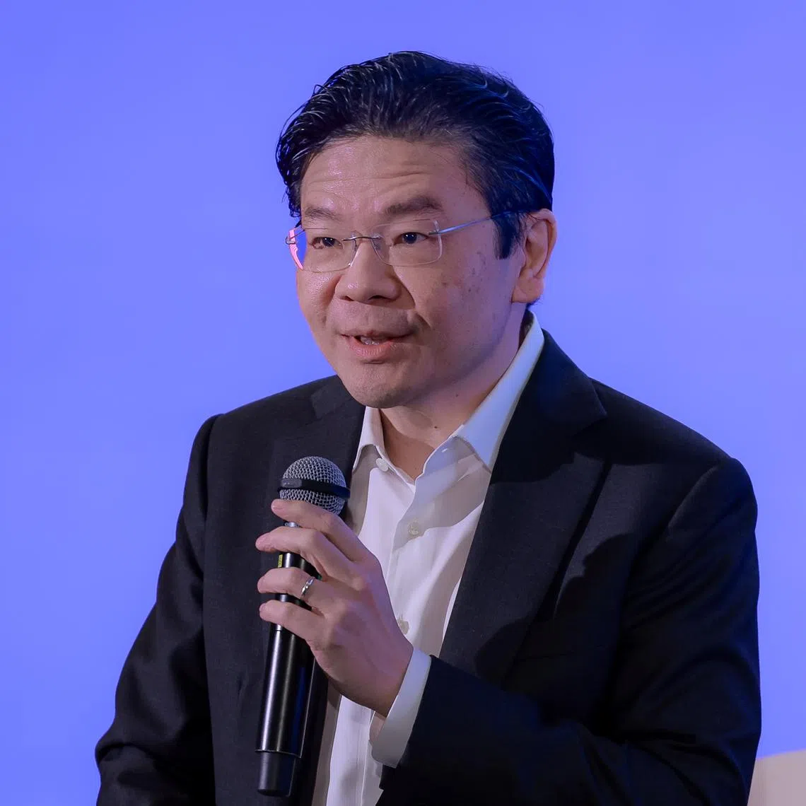 Prime Minister Lawrence Wong speaking at the Singapore Budget Symposium 2025 on March 19.
