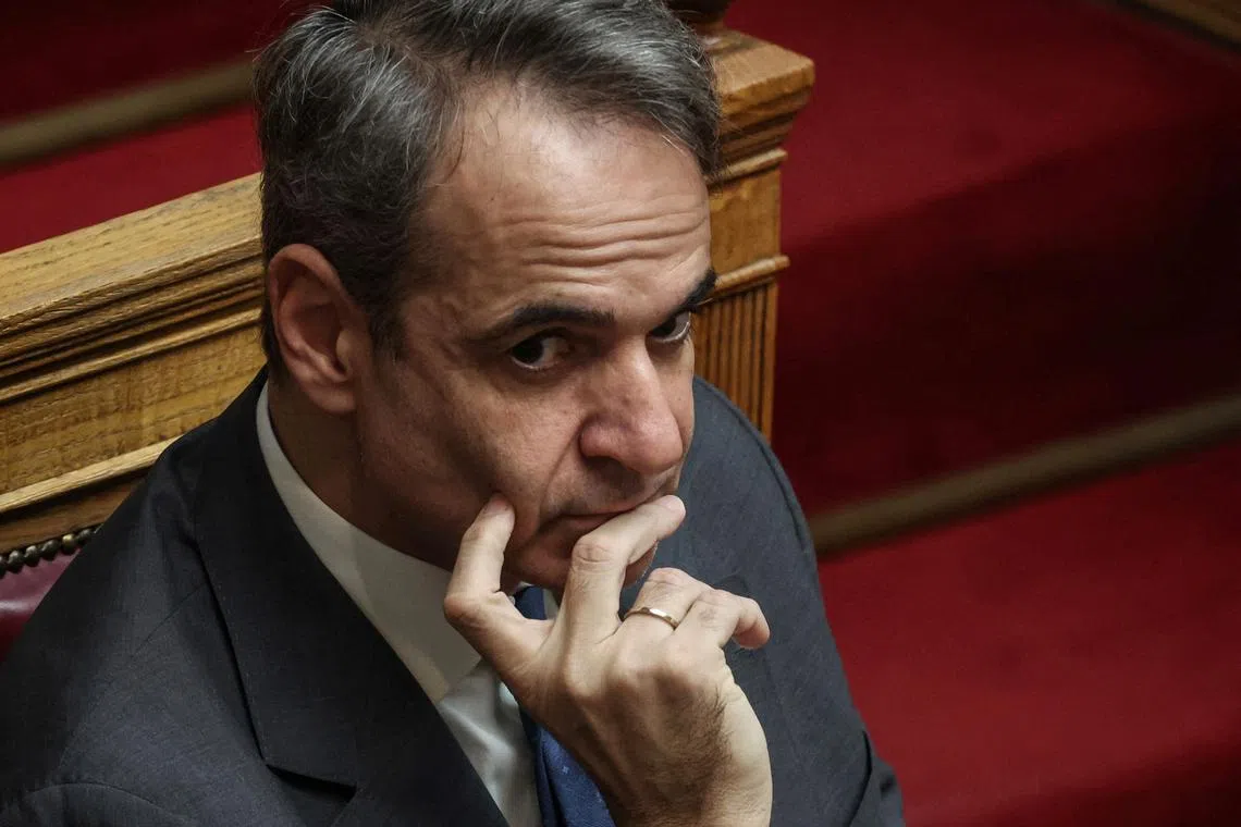 FILE PHOTO: Greek Prime Minister Kyriakos Mitsotakis at the Greek parliament in Athens, Greece, January 25, 2025. REUTERS/Louisa Gouliamaki/File Photo