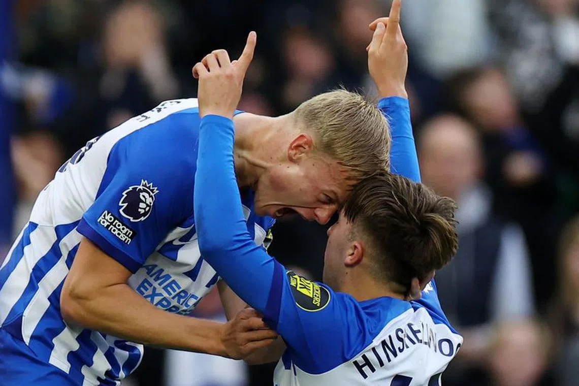 Soccer Football - Premier League - Brighton & Hove Albion v Crystal Palace - The American Express Community Stadium, Brighton, Britain - February 3, 2024 Brighton & Hove Albion's Jack Hinshelwood celebrates scoring their second goal with Jan Paul van Hecke REUTERS/Toby Melville