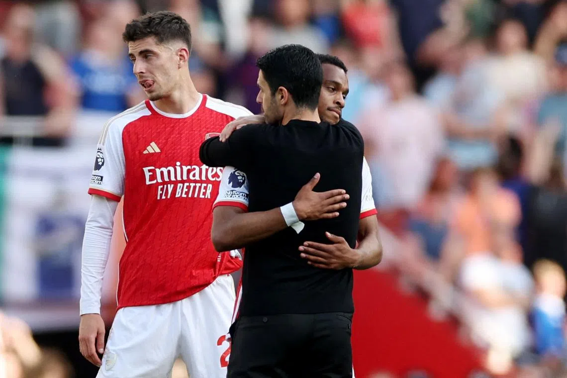 Soccer Football - Premier League - Arsenal v Everton - Emirates Stadium, London, Britain - May 19, 2024  Arsenal manager Mikel Arteta, Kai Havertz and Jurrien Timber react after the match Action Images via Reuters/Paul Childs