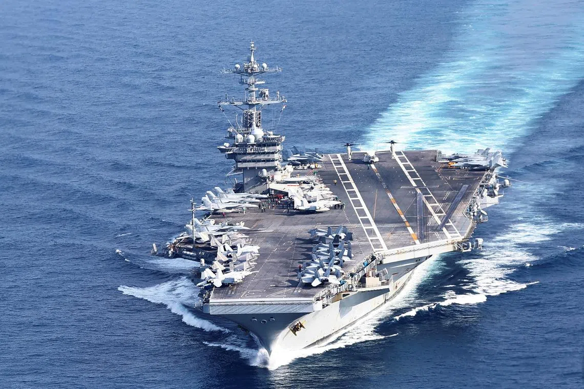FILE PHOTO: U.S. Navy aircraft carrier USS George Washington is pictured during Freedom Edge trilateral exercise among United States, Japan and South Korea in the East China Sea, south of the Korean peninsula and west of Japan's main islands November 14, 2024. REUTERS/Kim Kyung-Hoon/File Photo