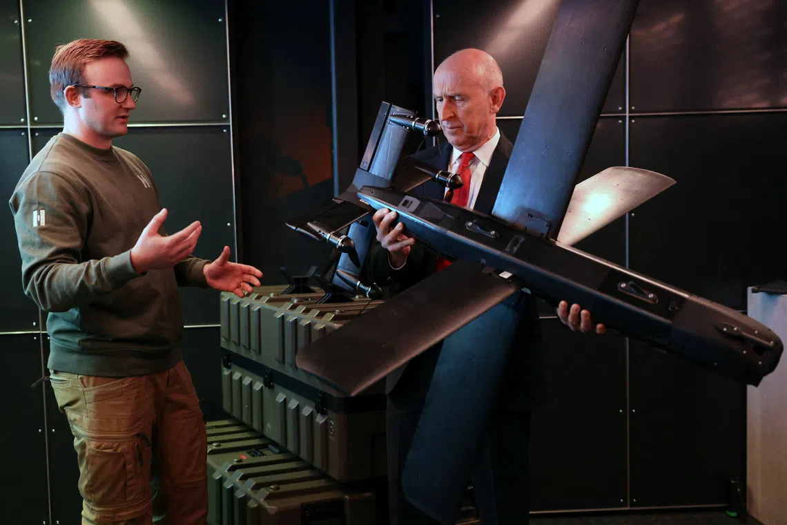 British Defence Secretary John Healey is shown around Helsing's new 'resilience factory' in Plymouth, Britain, November 19, 2025. UK MOD Crown/Cpl Tim Hammond /Handout via REUTERS THIS IMAGE HAS BEEN SUPPLIED BY A THIRD PARTY