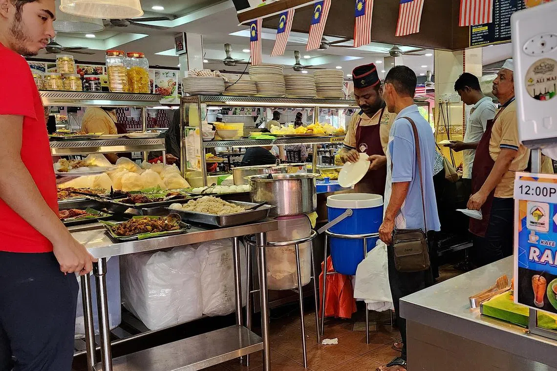 The Ali Maju mamak restaurant in the Kuala Lumpur suburb of Sri Rampai is one of the restaurants in Malaysia offering RM5 meals.