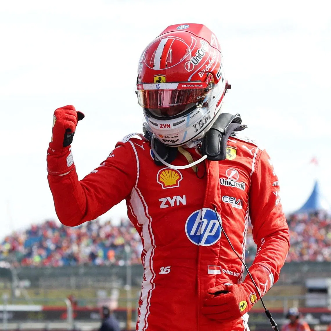 Ferrari’s Charles Leclerc celebrates at Silverstone after winning his first grand prix since 2024.