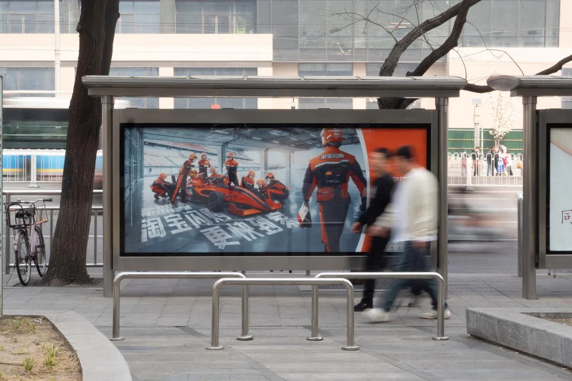A Taobao advertisement at a bus stop in Beijing to promote its on demand shopping services, in collaboration with the F1 Chinese Grand Prix.