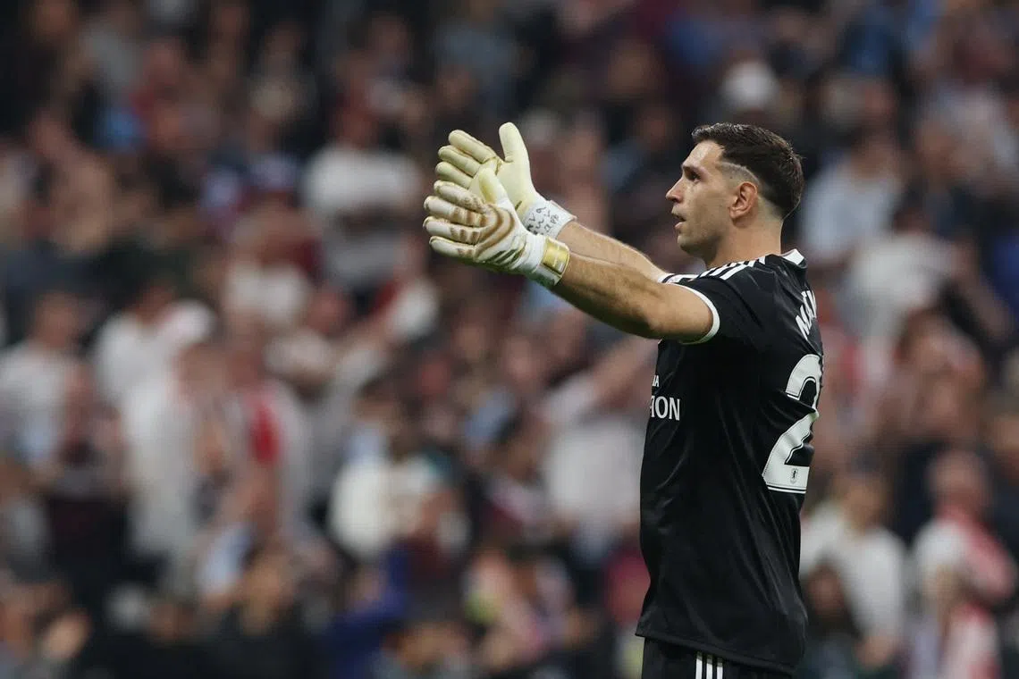 Soccer Football - UEFA Europa League - Final - SC Freiburg v Aston Villa - Besiktas Park, Istanbul, Turkey - May 20, 2026 Aston Villa's Emiliano Martinez celebrates after Youri Tielemans scores their first goal REUTERS/Umit Bektas