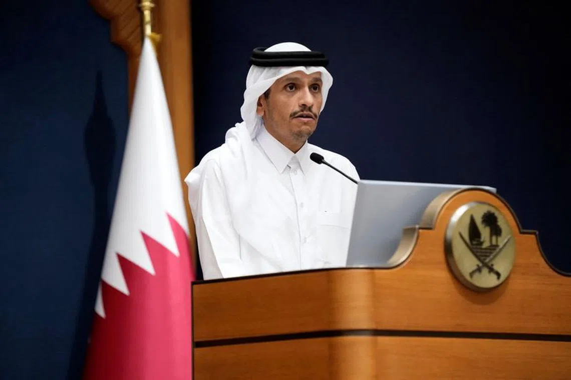 FILE PHOTO: Qatar's Prime Minister and Foreign Minister Mohammed bin Abdulrahman Al Thani makes statements to the media with U.S. Secretary of State Antony Blinken, in Doha, Qatar, October  13, 2023. Jacquelyn Martin/Pool via REUTERS/File Photo