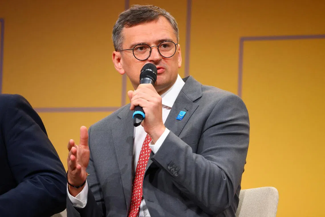 FILE PHOTO: Ukrainian Foreign Minister Dmytro Kuleba speaks during the Ukraine Recovery Conference in Berlin, Germany, June 11, 2024. REUTERS/Nadja Wohlleben/File Photo