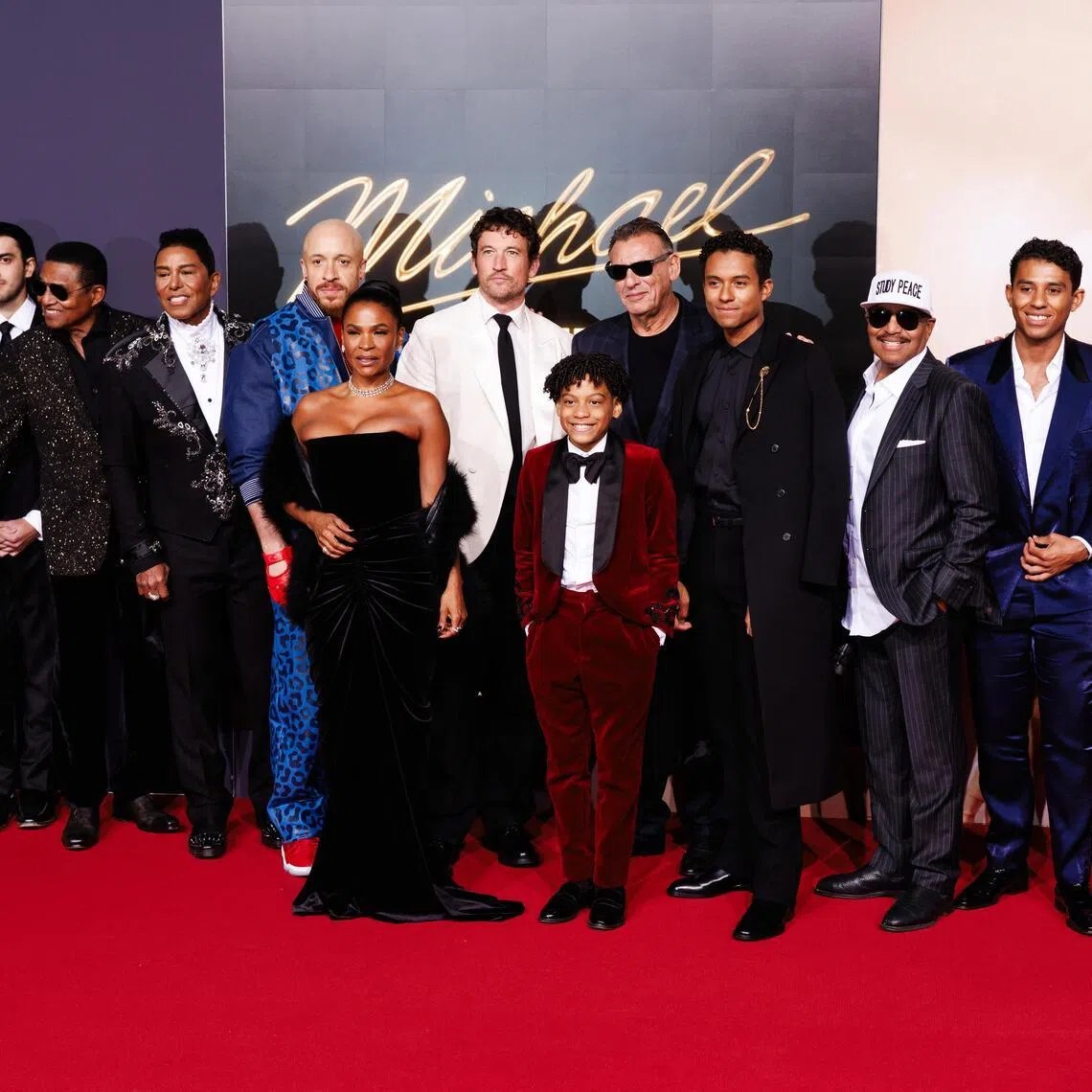(From left) Members of the Jackson family and cast Prince Jackson, Bigi Jackson, Jackie Jackson, Jermaine Jackson, KeiLyn Durrel Jones, Nia Long, Miles Teller, Juliano Krue Valdi, Graham King, Jaafar Jackson, Marlon Jackson, Jermajesty Jackson and Randy Jackson Jr. at the premiere of Michael in Berlin, Germany on April 10, 2026. 